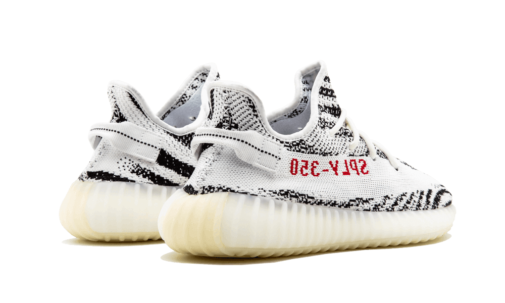 https://cdn.shopify.com/s/files/1/2358/2817/products/Wethenew-Sneakers-France-Adidas-Yeezy-Boost-350-V2-Zebra-3.png?v=1541153779